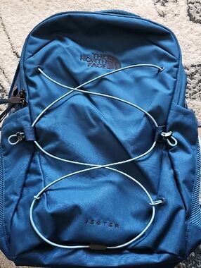 The North Face Jester Backpack in Blue with Light Blue Bungee
